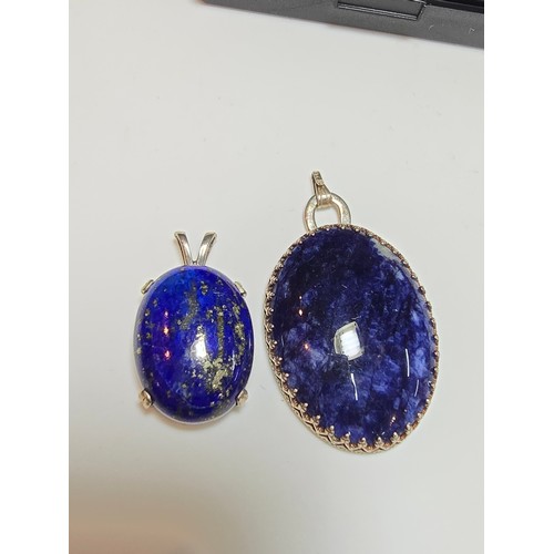 295 - 2x pretty 925 silver semi precious stone pendants 1 is inset with a large oval blue lapis lazuli fea... 