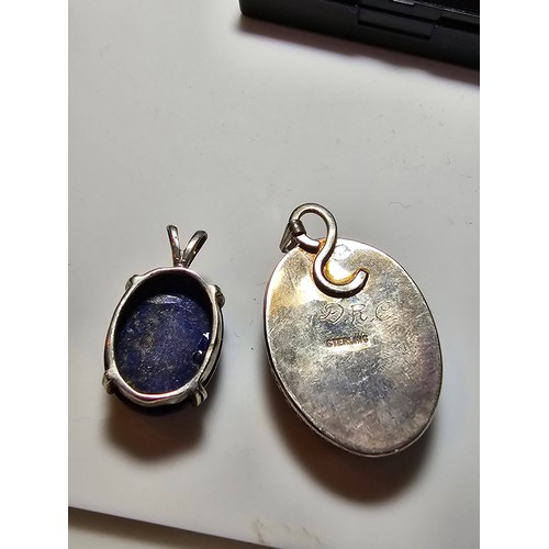 295 - 2x pretty 925 silver semi precious stone pendants 1 is inset with a large oval blue lapis lazuli fea... 