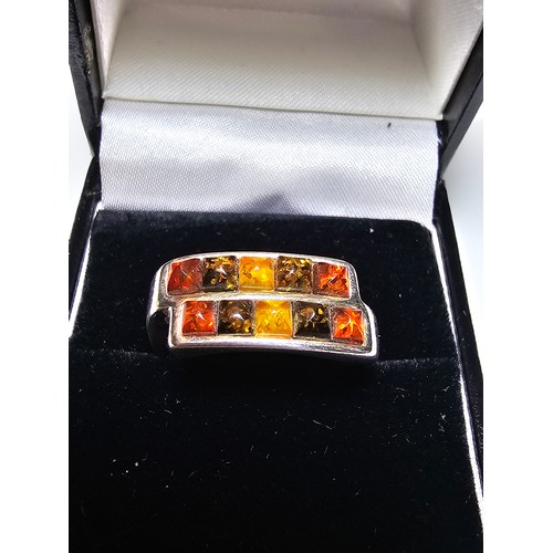 297 - A stunning 925 silver ring double channel set with natural amber stones in 3 different colours from ... 