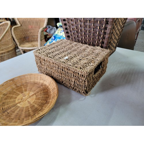 429 - Quantity of household items inc a wicker bin, a lidded rattan storage box, a quantity of wicker bowl... 