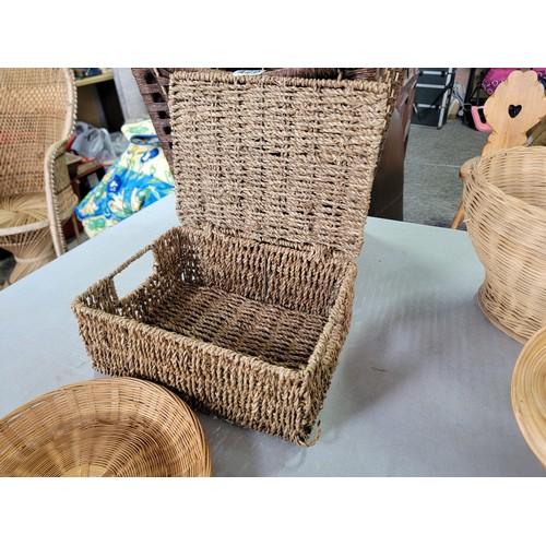 429 - Quantity of household items inc a wicker bin, a lidded rattan storage box, a quantity of wicker bowl... 