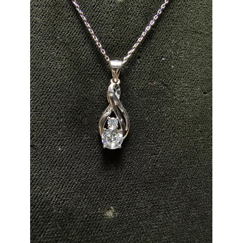 298 - A new and unused pretty 925 silver pendant inset with 2 sparkly CZ crystal stones on an 18