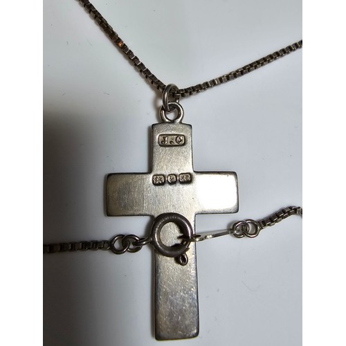 303 - A fully hallmarked 925 silver vintage engraved cross pendant set on a good long 20