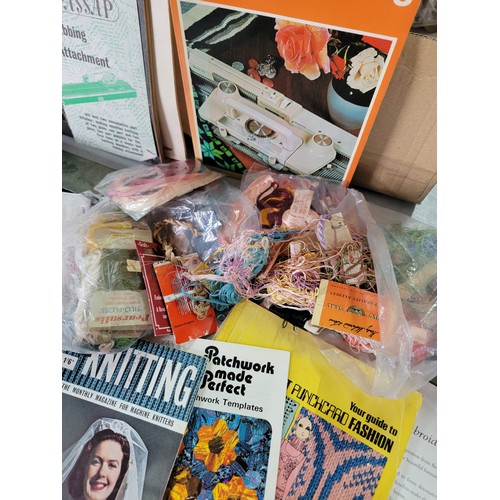 439 - Box containing a large quantity of sewing and knitting accessories inc sewing books, bobbins, tape m... 