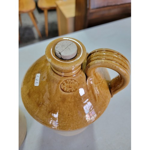 458 - Pair of Earthenware flagons both stamped Price Bristol, 1x with cork stopper. Smallest flagon has mi... 