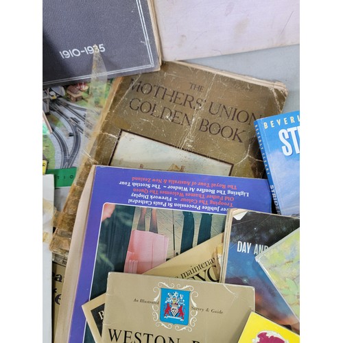 447 - Suitcase containing a large quantity of assorted books inc The Great Events of the Royal Year 1953, ... 