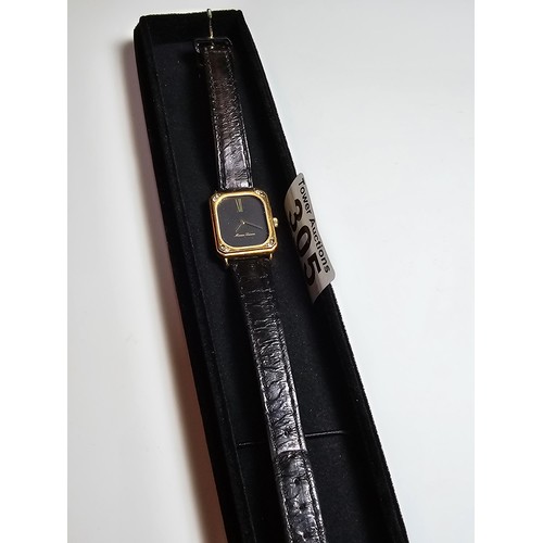 305 - A good quality vintage Maurice Lacroix ladies wrist watch with a leather strap featuring a 17 jewel ... 