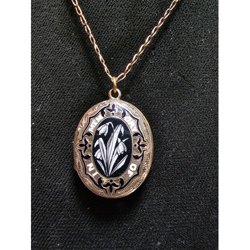 316 - An antique good quality mourning locket on an 18