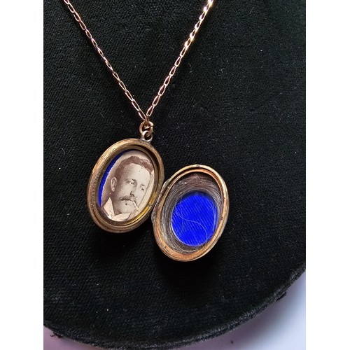 316 - An antique good quality mourning locket on an 18