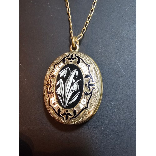 316 - An antique good quality mourning locket on an 18