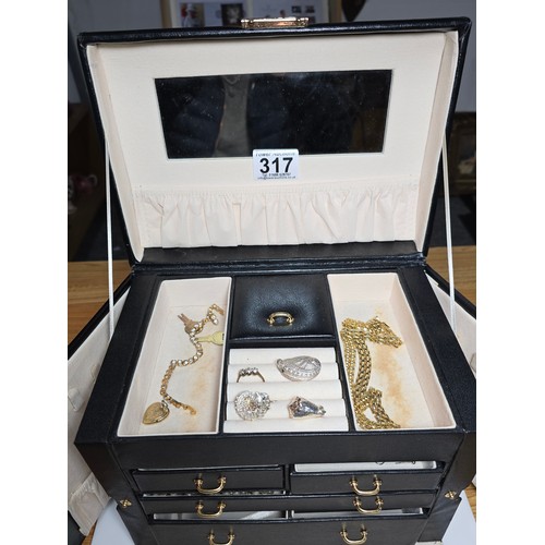 317 - A good quality leather type jewellery storage box containing a good quantity of costume jewellery wh... 