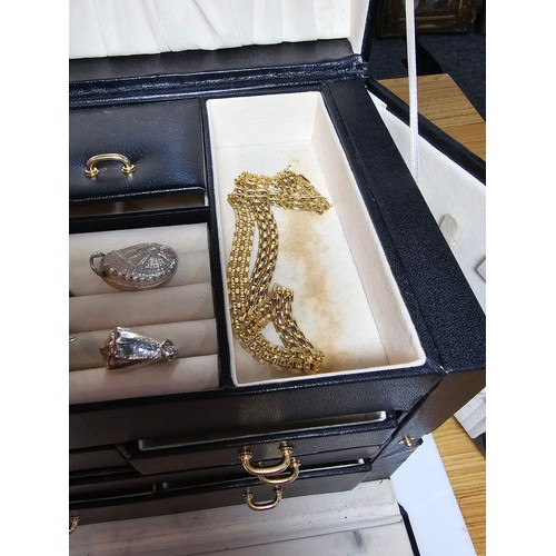 317 - A good quality leather type jewellery storage box containing a good quantity of costume jewellery wh... 