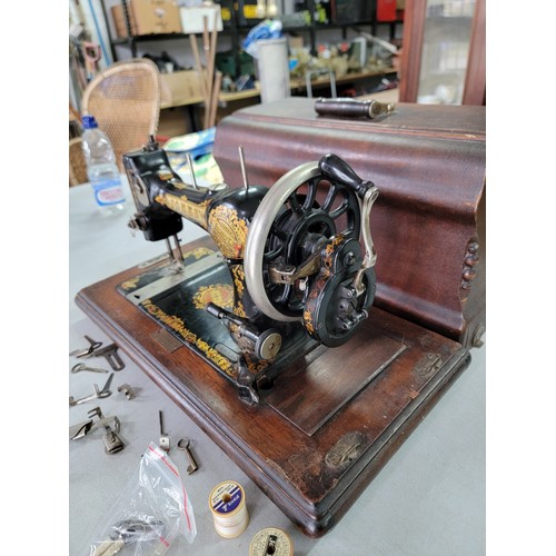 477 - Cased Antique Jones Family sewing machine as supplied to Her Majesty Queen Alexandra for the Manches... 