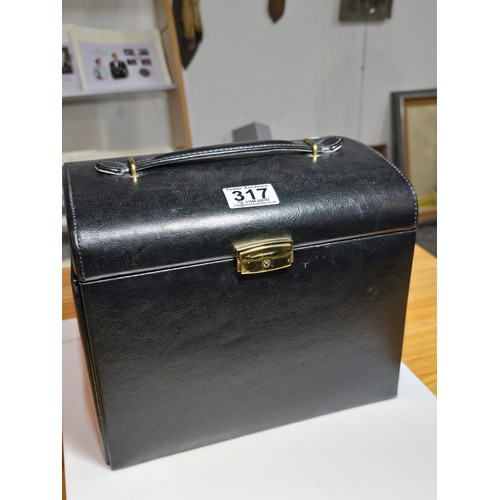 317 - A good quality leather type jewellery storage box containing a good quantity of costume jewellery wh... 