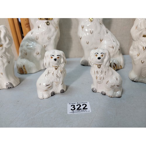 322 - A good graduated set of 3 pairs of Staffordshire dogs all by Beswick, 1 dog is unusually stamped Roy... 