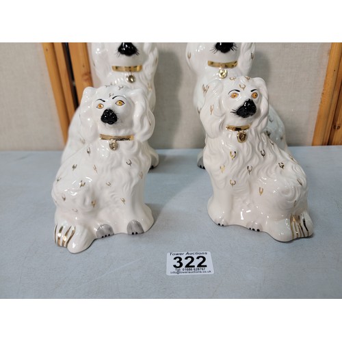 322 - A good graduated set of 3 pairs of Staffordshire dogs all by Beswick, 1 dog is unusually stamped Roy... 