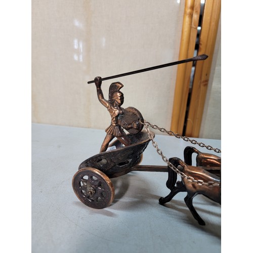 323 - We have a copper Roman model of a 2 horse driven chariot with a Roman figure on board along with 2 c... 