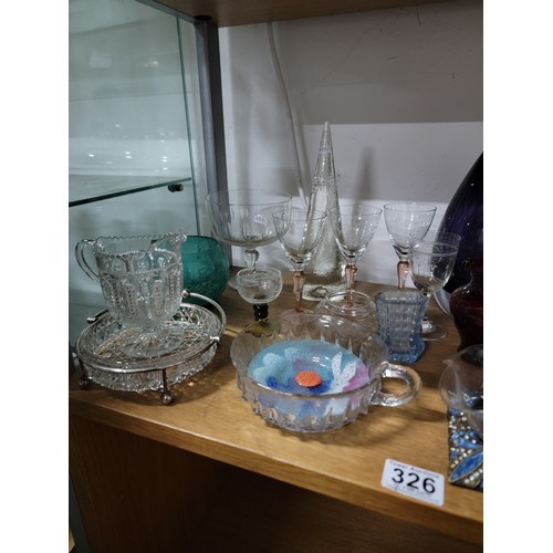 326 - A shelf full of good collectable glass to include a good amethyst glass heavy vase by Riihimaki Finl... 