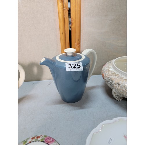 325 - A shelf full of collectable ceramic to include a good Victorian black lidded jug with a gilt design ... 