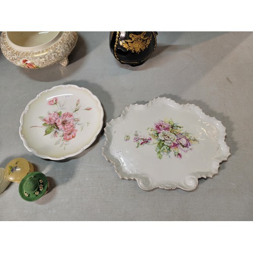 325 - A shelf full of collectable ceramic to include a good Victorian black lidded jug with a gilt design ... 