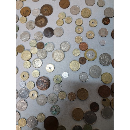 260 - A tub containing a large quantity of various vintage and antique world coins, please study photos fo... 