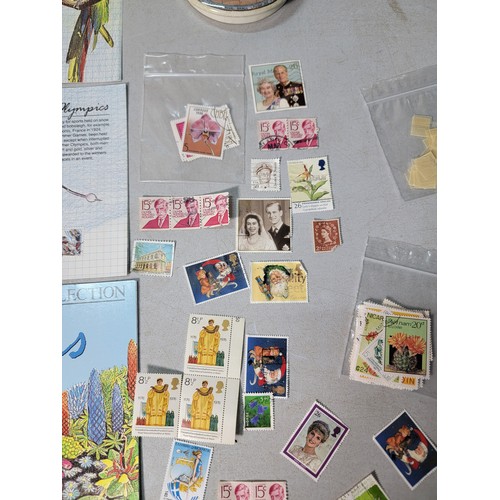 266 - A collection of various stamps and stamp sets along with a good antique prattware lid, in good condi... 