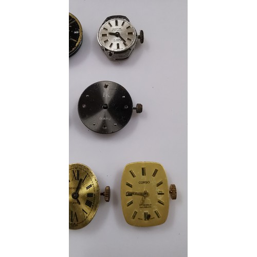 267D - Large quantity of various mechanical watch movements and dials, along with a small button case. To i... 