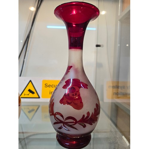 256 - A pair of stunning antique hand blown bohemian type ruby glass vases with an etched stag and doe sce... 