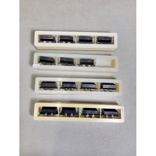 33 - Collection of 4x display containers containing a quantity of rolling stock carriages by Roco Interna... 