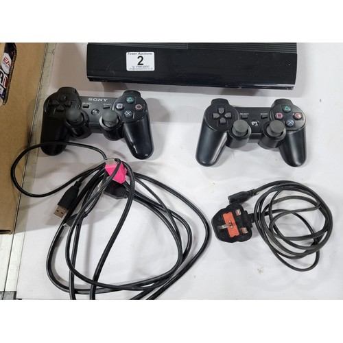 2 - Playstation 3 ultra slim along with a  2x controllers, quantity of games to inc fifa, tomb rader etc... 