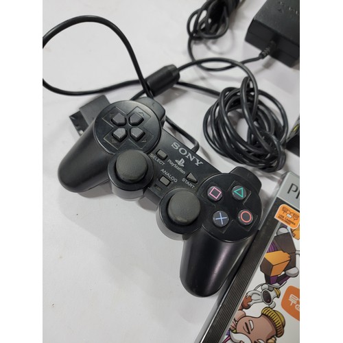 4 - Sony PlayStation 2 slim with PlayStation 2 Eyetoy play game and USB camera along with 1 controller, ... 