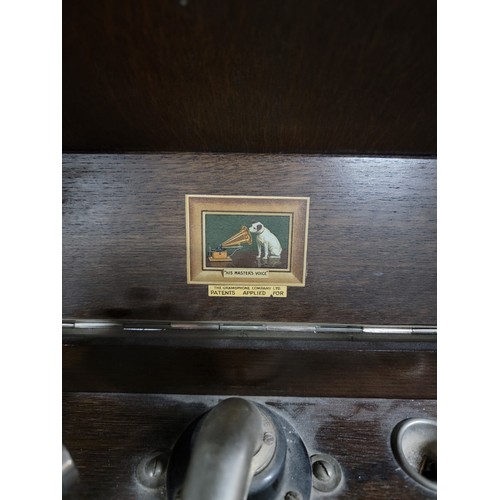 9 - HMV tabletop 109 gramophone along with gramophone needles and a large quantity of 78 records in albu... 