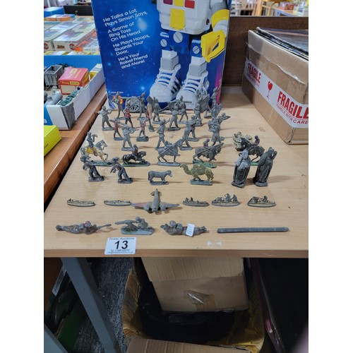 13 - A large quantity of flat back lead figurines inc military figures, animals, boats, cannons etc, all ... 