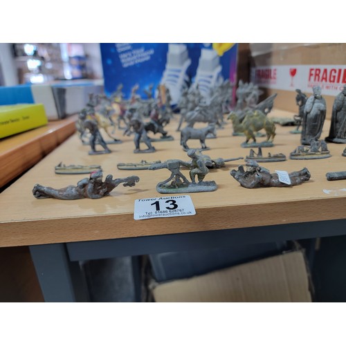 13 - A large quantity of flat back lead figurines inc military figures, animals, boats, cannons etc, all ... 