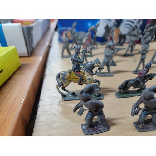 13 - A large quantity of flat back lead figurines inc military figures, animals, boats, cannons etc, all ... 