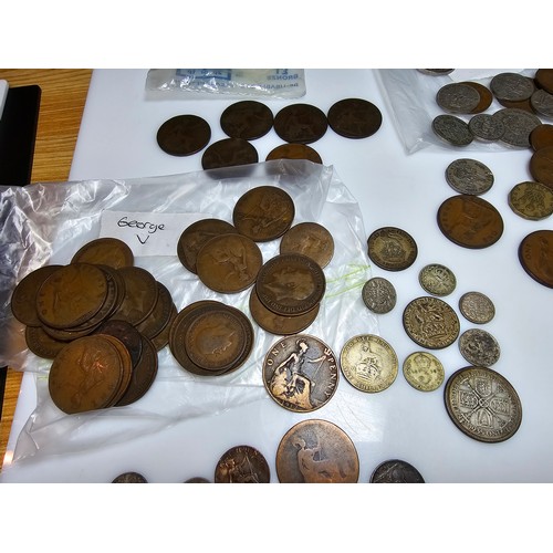 323 - Selection of organized antique British coins covering various reigns which includes 2x good conditio... 