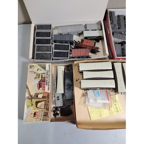 39 - 4x boxes containing a large quantity of Airfix models in oo gauge inc a quantity of 6x fuel tanks, 5... 