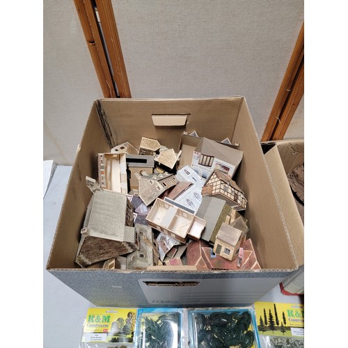 52 - 2x boxes containing a large quantity of model railway accessories inc a large quantity of cardboard ... 