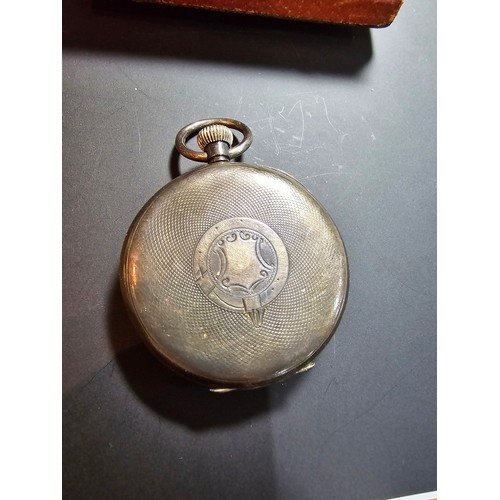 328 - Hallmarked silver pocket watch complete with its leather travel case, pocket watch is in good overal... 