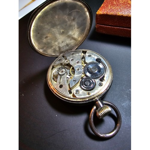 328 - Hallmarked silver pocket watch complete with its leather travel case, pocket watch is in good overal... 