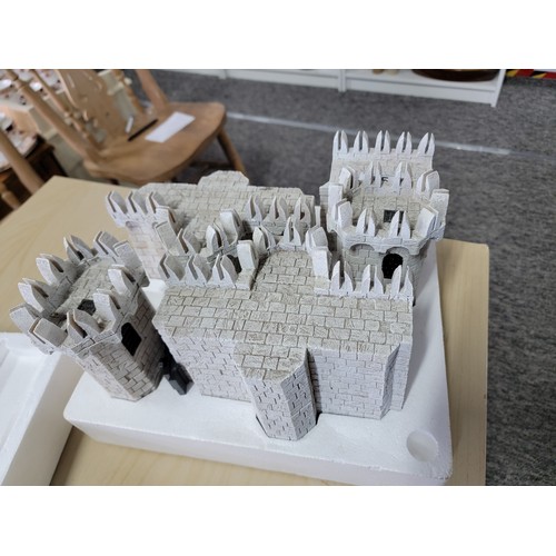 55 - A Games Workshop The lord of The Rings Minas Tirith set, box contains the castle with no figures