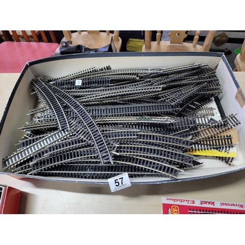 57 - Box containing a large quantity of Hornby OO gauge railway track along with a locomotive steam style... 