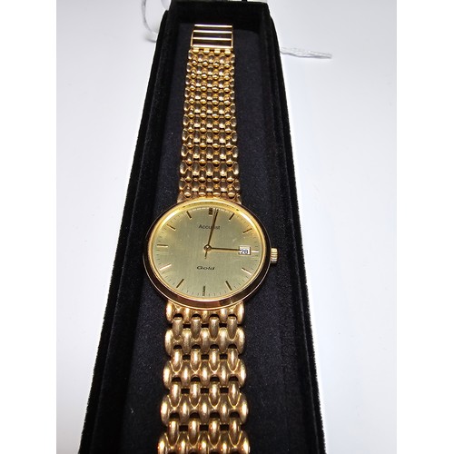 331 - Good quality hallmarked 9ct. yellow gold gents wristwatch by Accurist which feature 9ct. gold strap ... 