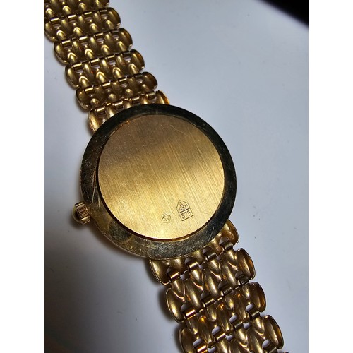 331 - Good quality hallmarked 9ct. yellow gold gents wristwatch by Accurist which feature 9ct. gold strap ... 