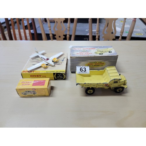 63 - 3x boxed Dinky vehicles inc a Euclid rear dump truck, a Beechcraft C55 Baron plane and a sealed Dink... 