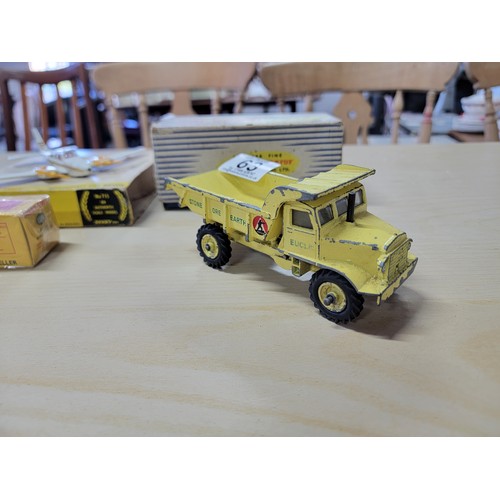 63 - 3x boxed Dinky vehicles inc a Euclid rear dump truck, a Beechcraft C55 Baron plane and a sealed Dink... 