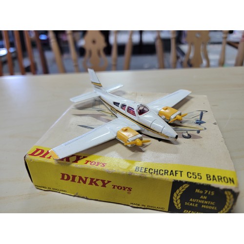 63 - 3x boxed Dinky vehicles inc a Euclid rear dump truck, a Beechcraft C55 Baron plane and a sealed Dink... 