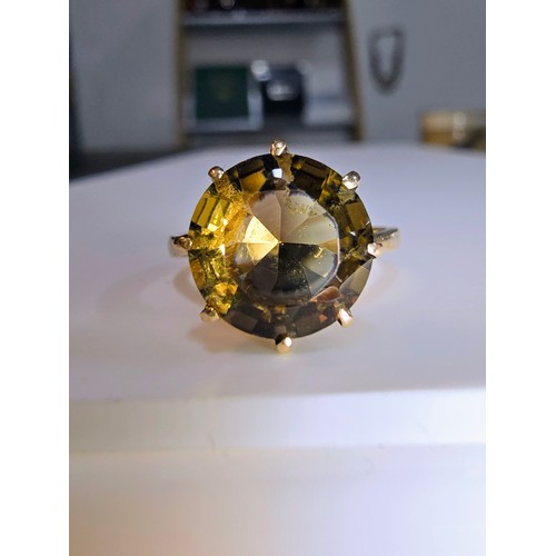 347 - Hallmarked 9ct yellow gold signet ring inset with a large and impressive faceted natural Citrine gem... 