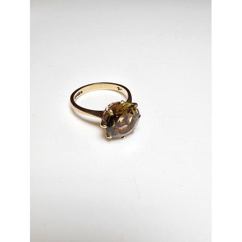 347 - Hallmarked 9ct yellow gold signet ring inset with a large and impressive faceted natural Citrine gem... 