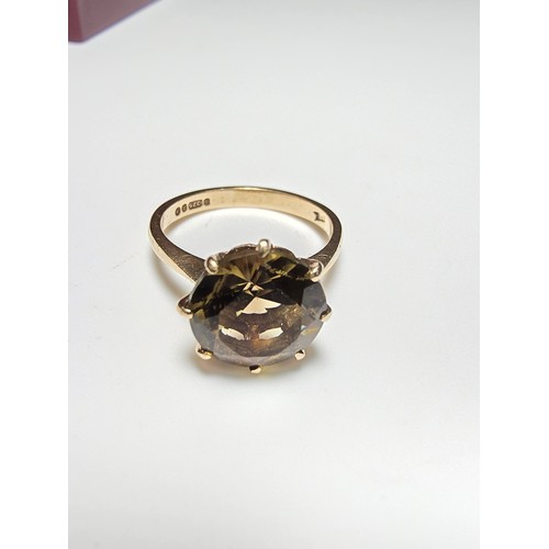 347 - Hallmarked 9ct yellow gold signet ring inset with a large and impressive faceted natural Citrine gem... 